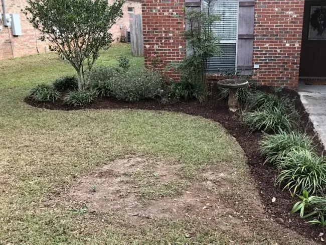 Flower bed maintenance for a clean West Mobile property