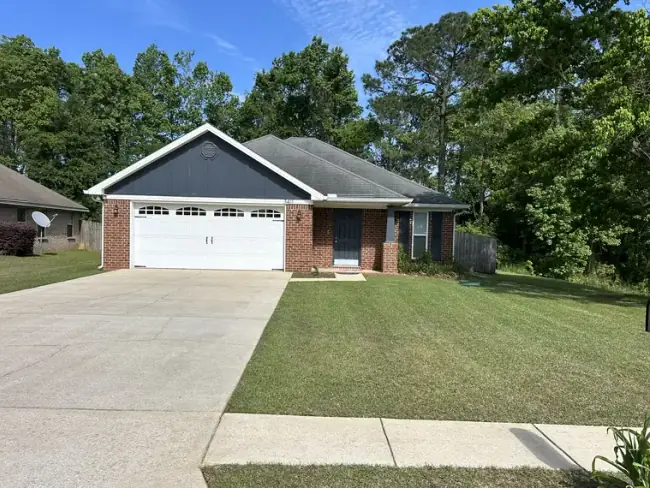 Regular lawn service with mowing and clean edging in West Mobile