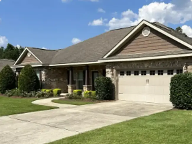 Bush trimming at a West Mobile-area home